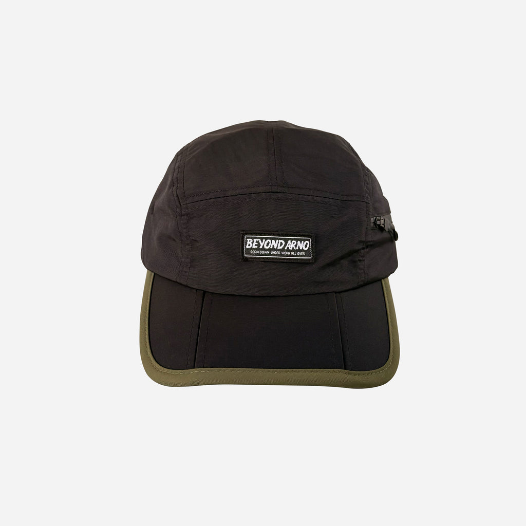 Beyond Arno foldable trail cap with zipped pocket in pine, front view