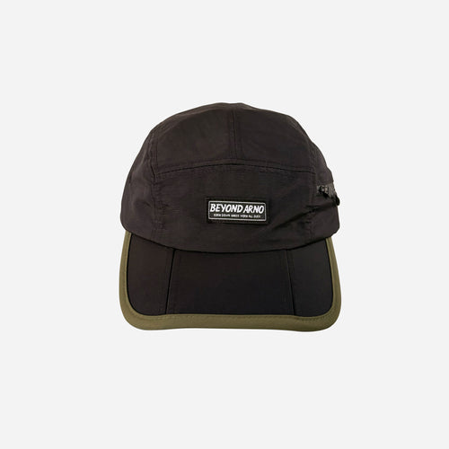 Beyond Arno foldable trail cap with zipped pocket in pine, front view