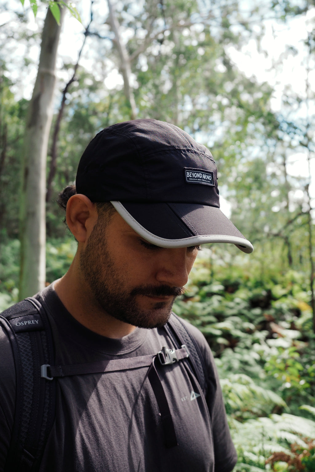 Beyond Arno foldable trail cap with zipped pocket in silver, lifestyle front view