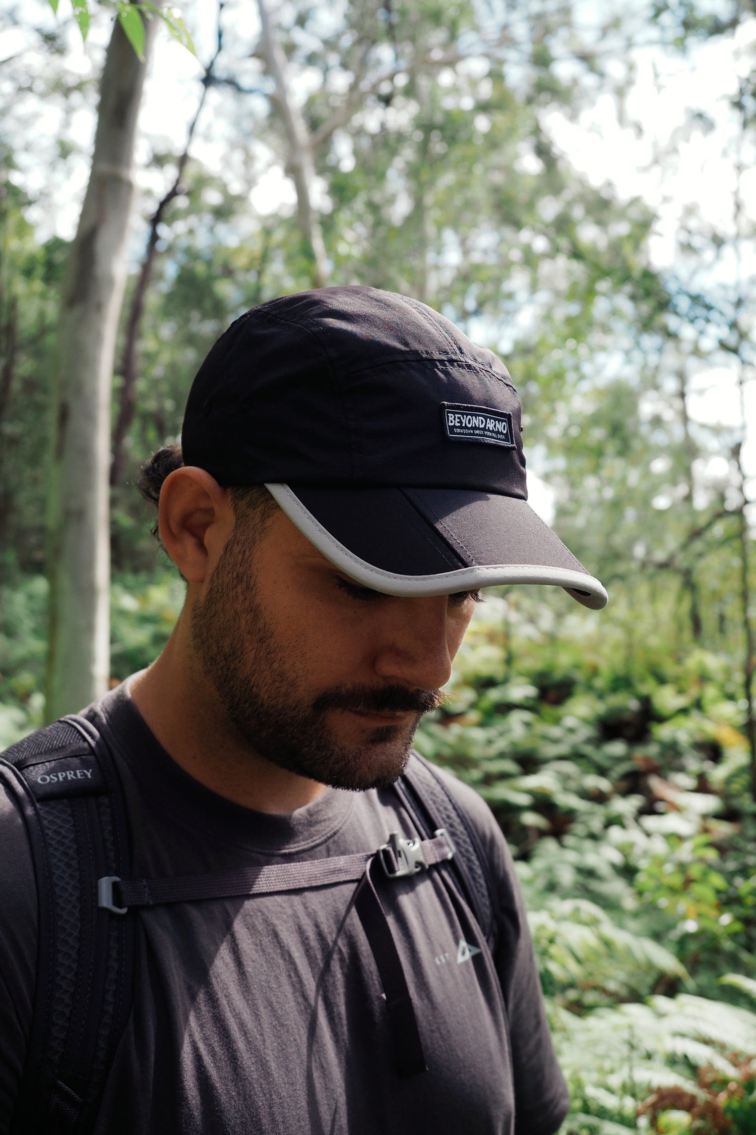 Beyond Arno foldable trail cap with zipped pocket in silver, lifestyle front view